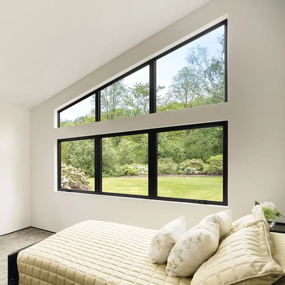Interior view of black bedroom Marvin Replacement special shape windows.