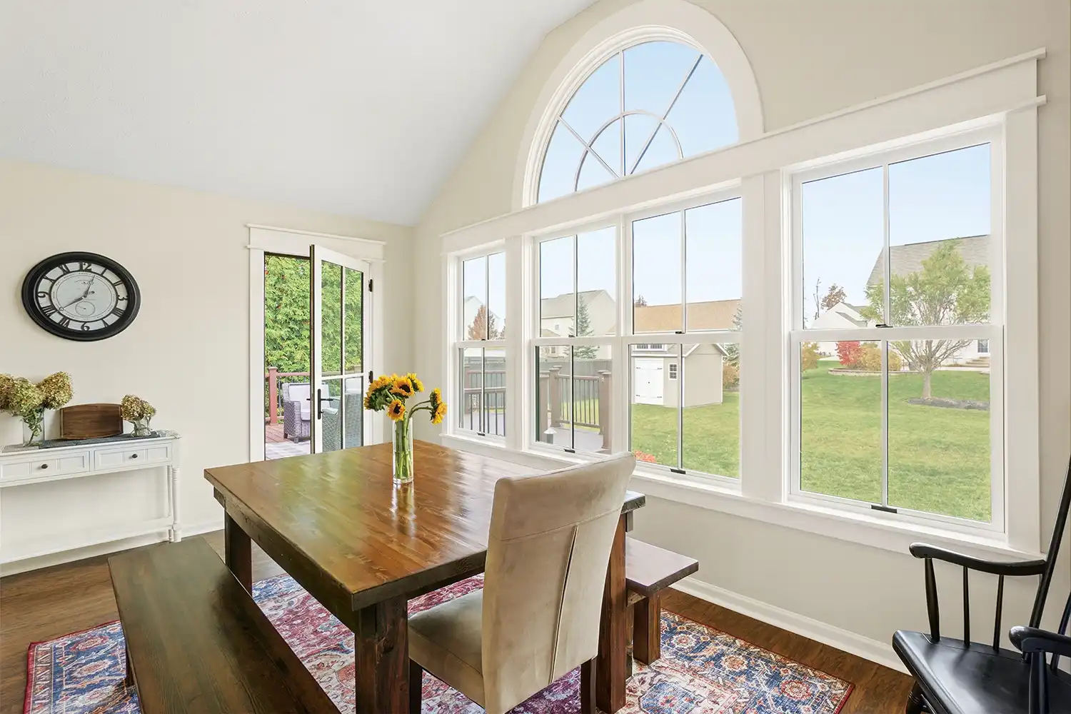 Interior view of an arch window in a dining room.