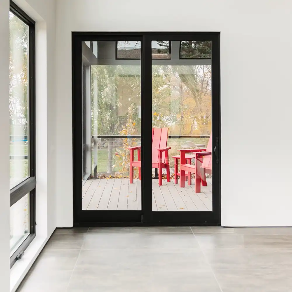 Interior view of a two-panel black sliding French door.
