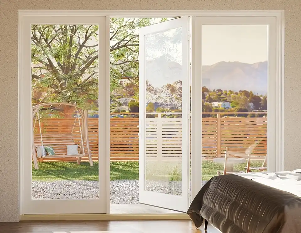 Interior view of a three-panel white Marvin Replacement Outswing French Door